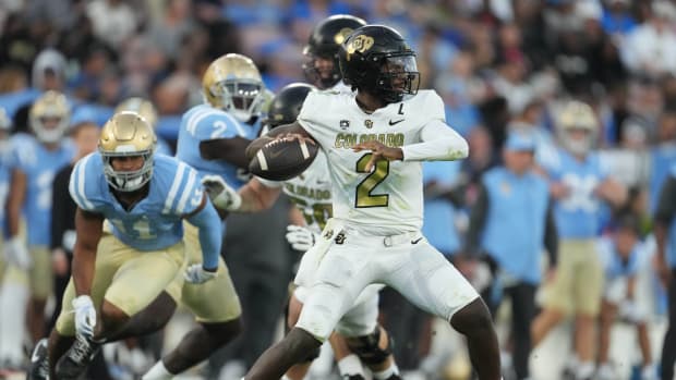 Colorado Buffaloes quarterback Shedeur Sanders (2) throws the ball against the UCLA Bruins in the first half at Rose Bowl
